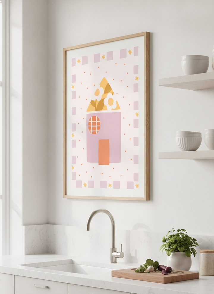 Artwork styled on the wall of a bright modern kitchen