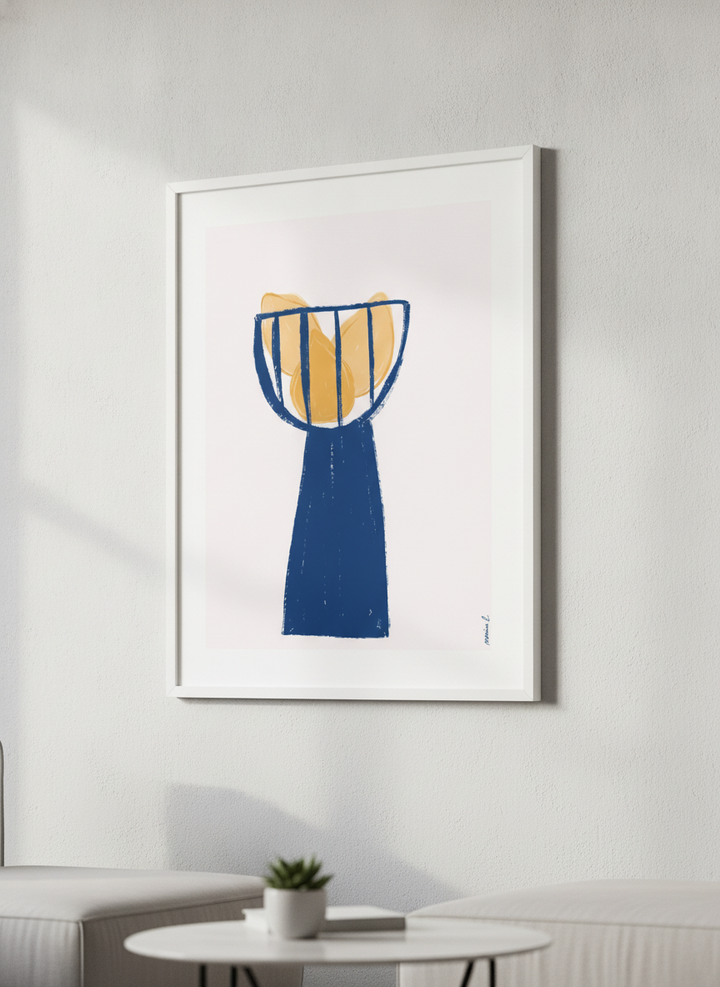 Modern wall art styled above a sofa in a neutral living room