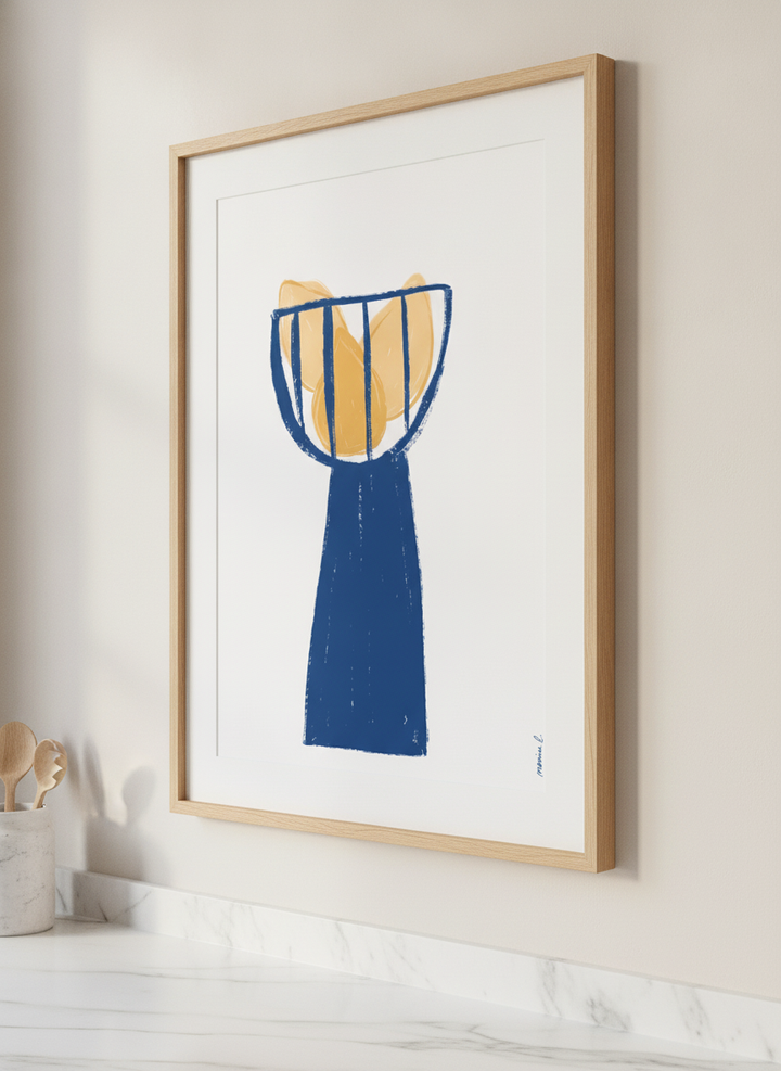 Artwork styled on the wall of a bright modern kitchen
