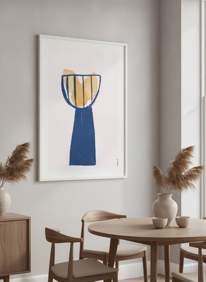 Wall art styled above a dining table in a contemporary home