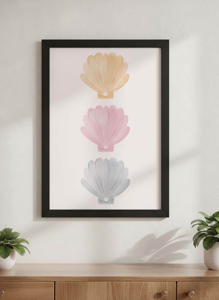 Modern wall art styled above a sofa in a neutral living room