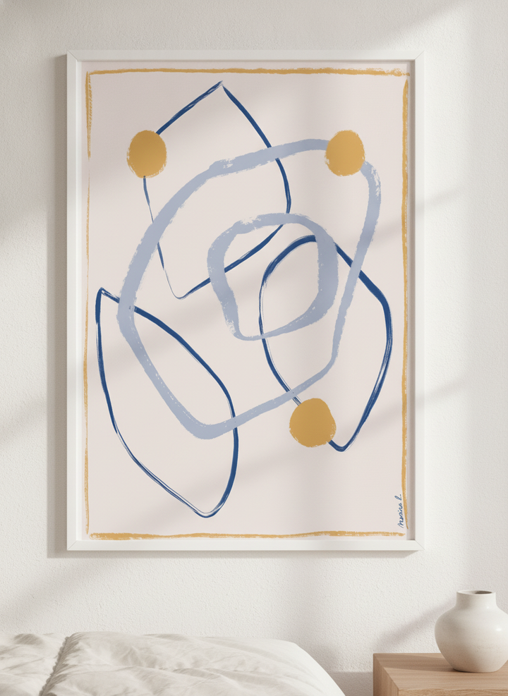 Minimalist artwork displayed in a calm, light-filled bedroom interior