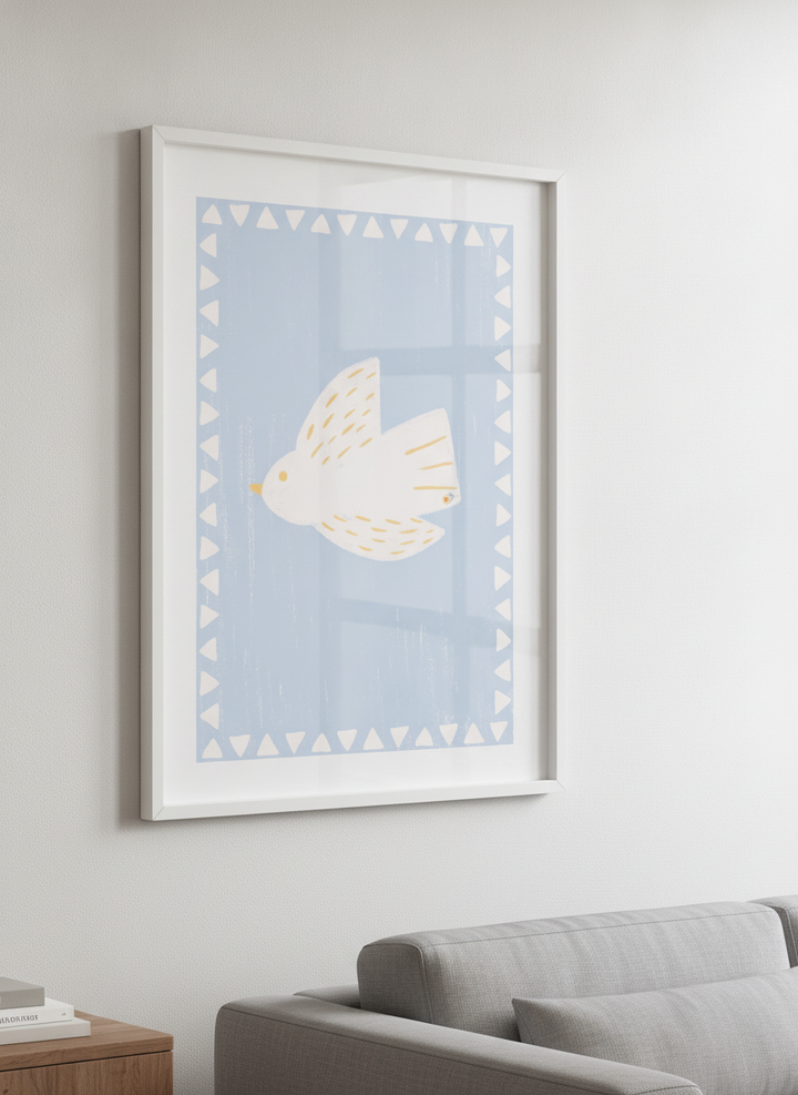Modern wall art styled above a sofa in a neutral living room