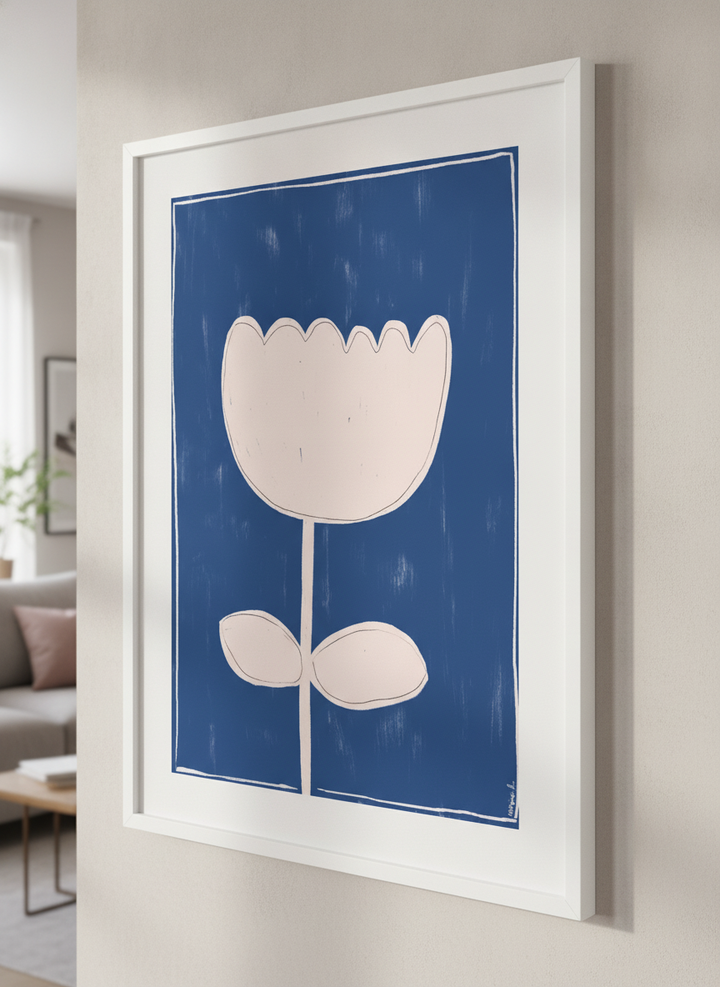 Modern wall art styled above a sofa in a neutral living room