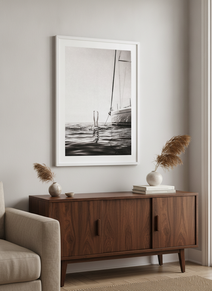Artwork displayed above a credenza in a real-looking contemporary home