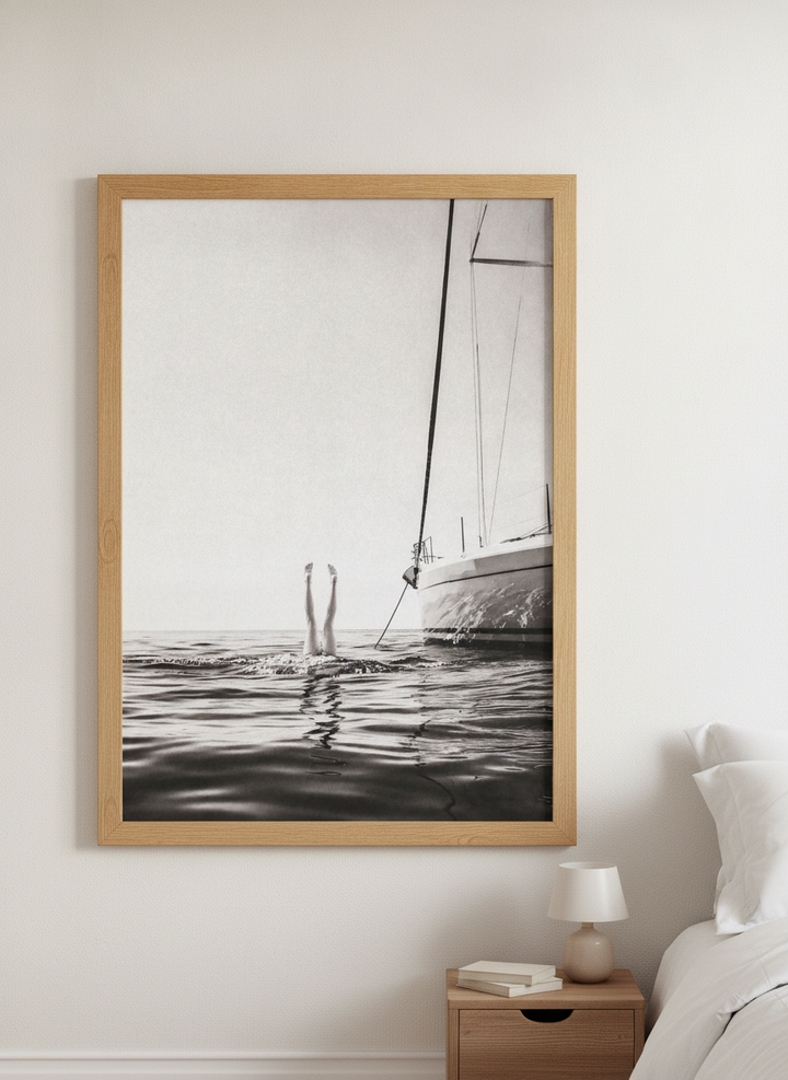 Minimalist artwork displayed in a calm, light-filled bedroom interior