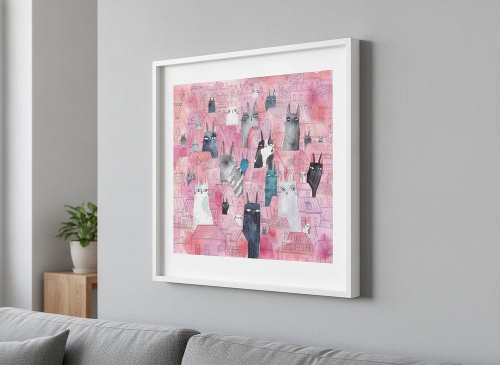 Modern wall art styled above a sofa in a neutral living room
