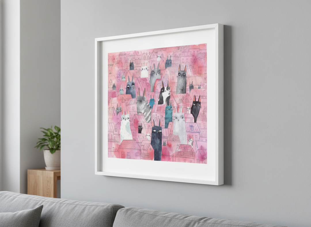 Modern wall art styled above a sofa in a neutral living room