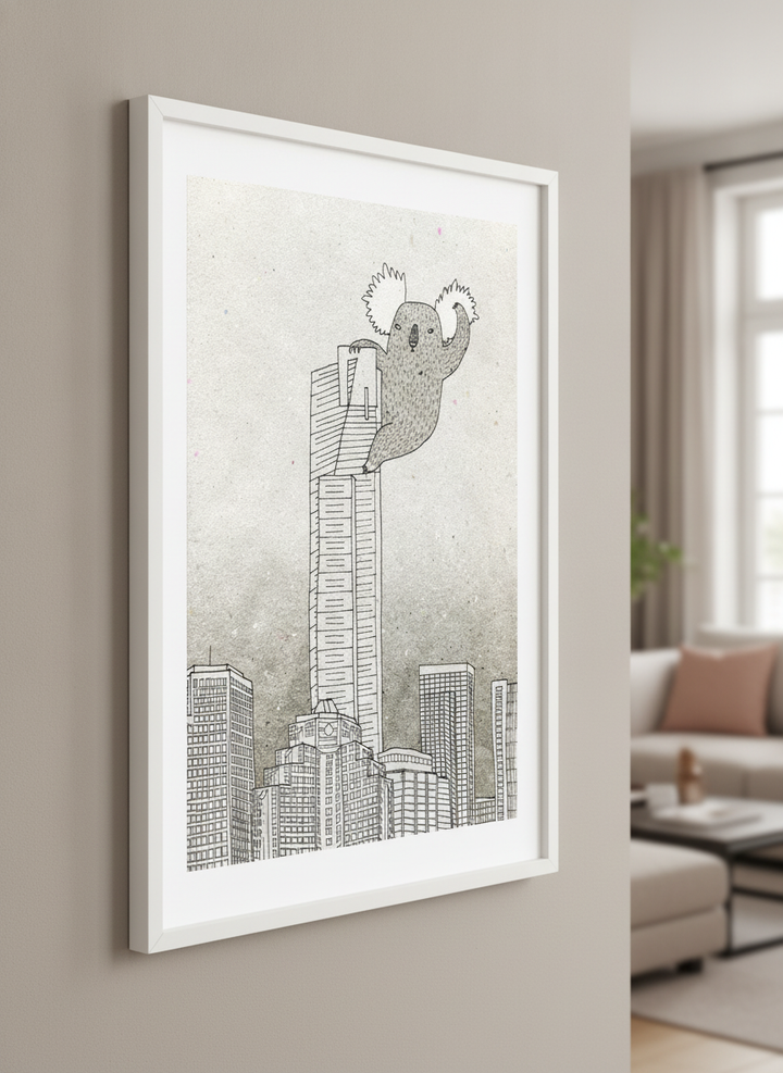 Modern wall art styled above a sofa in a neutral living room