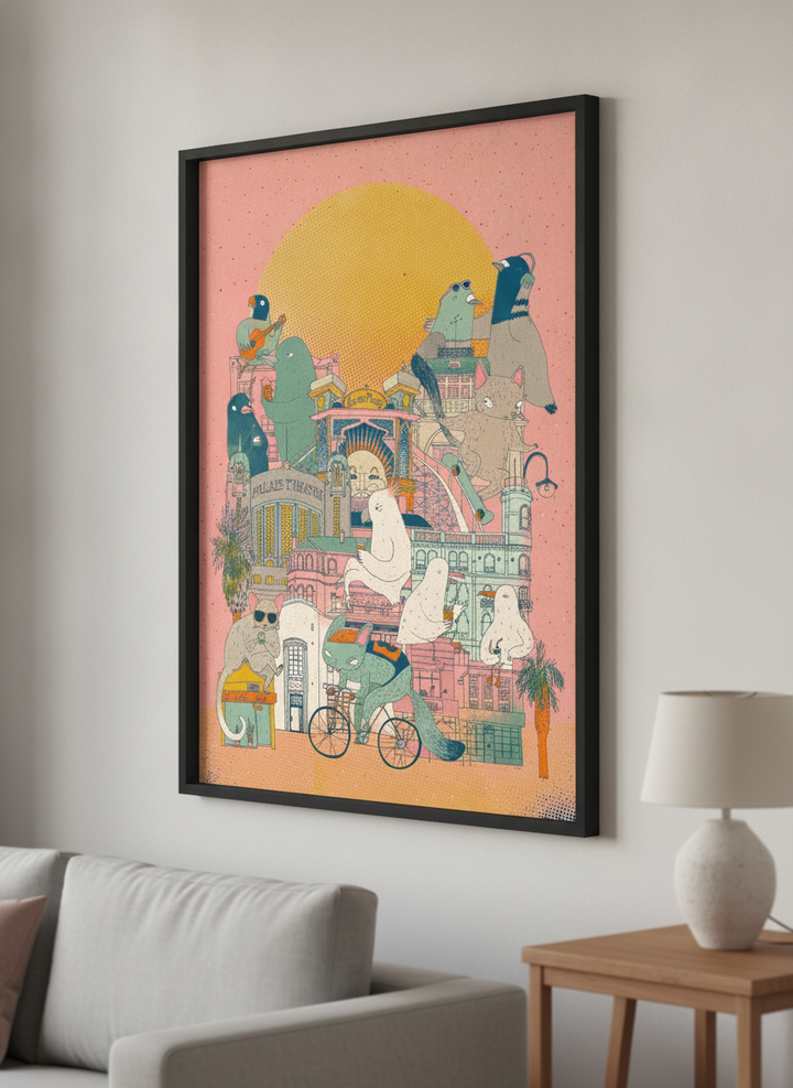 Modern wall art styled above a sofa in a neutral living room