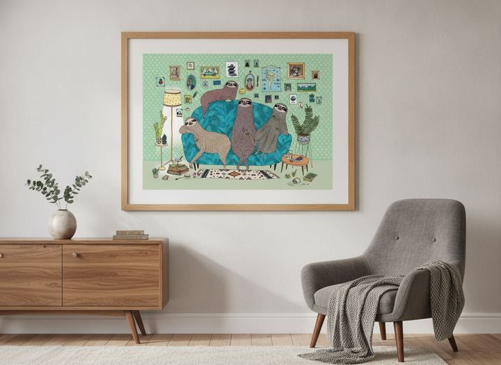 Modern wall art styled above a sofa in a neutral living room