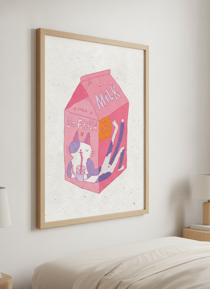 Minimalist artwork displayed in a calm, light-filled bedroom interior