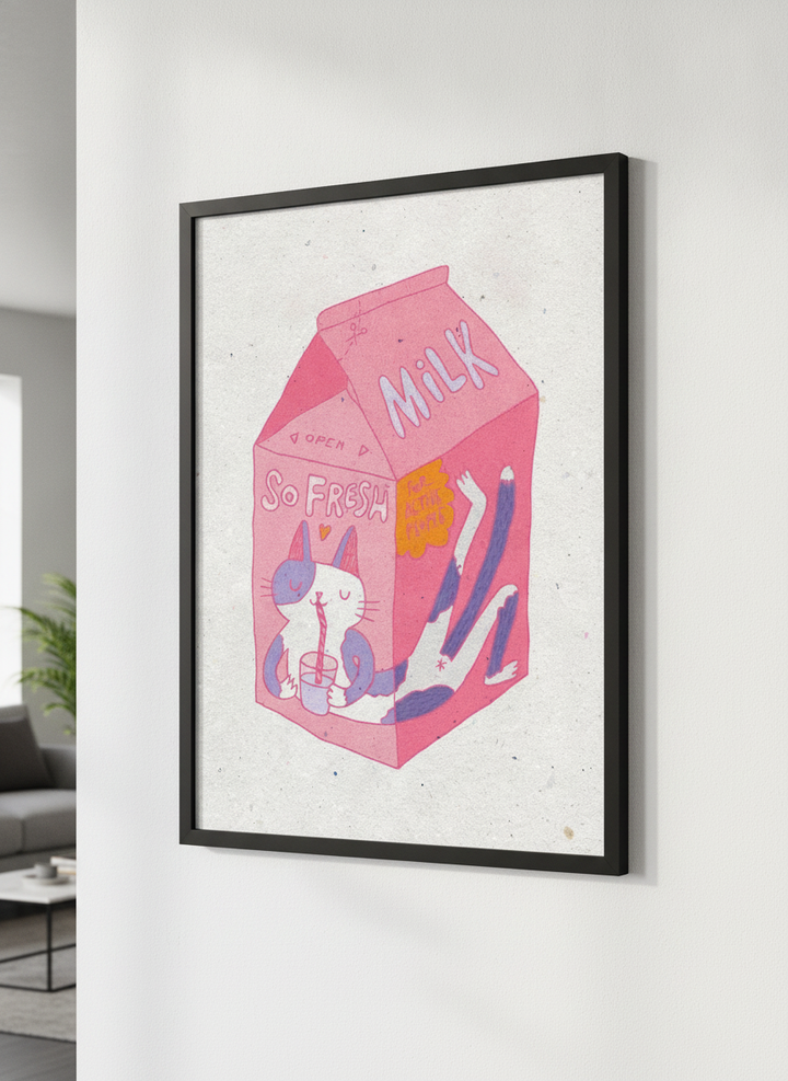 Modern wall art styled above a sofa in a neutral living room