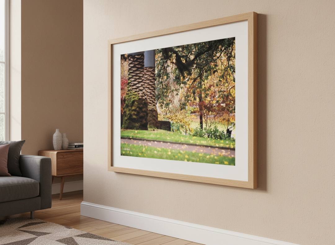 Modern wall art styled above a sofa in a neutral living room