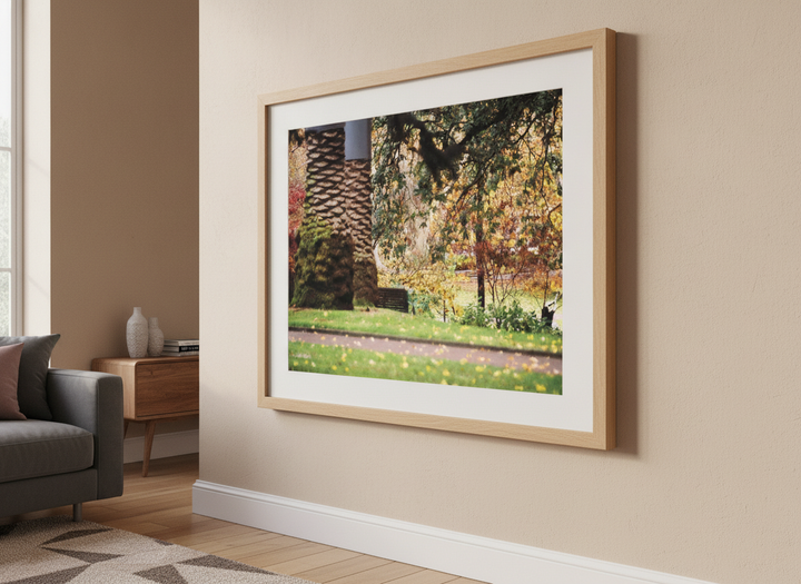 Modern wall art styled above a sofa in a neutral living room