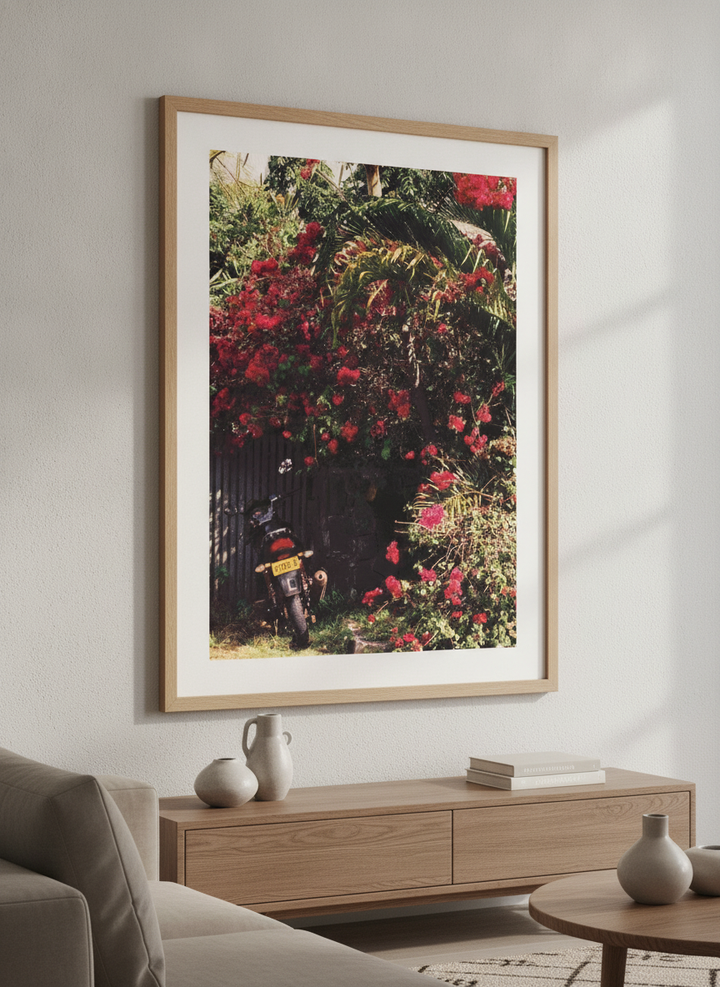 Modern wall art styled above a sofa in a neutral living room