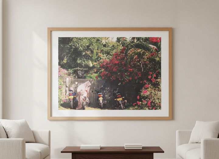 Modern wall art styled above a sofa in a neutral living room