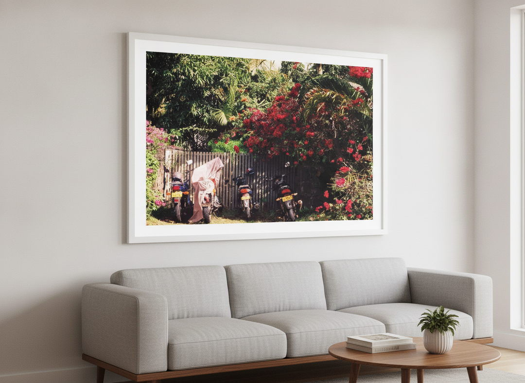 Modern wall art styled above a sofa in a neutral living room