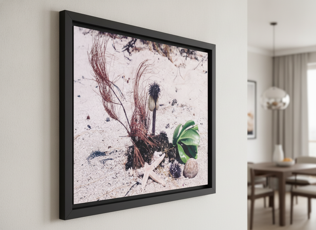 Wall art styled above a dining table in a contemporary home