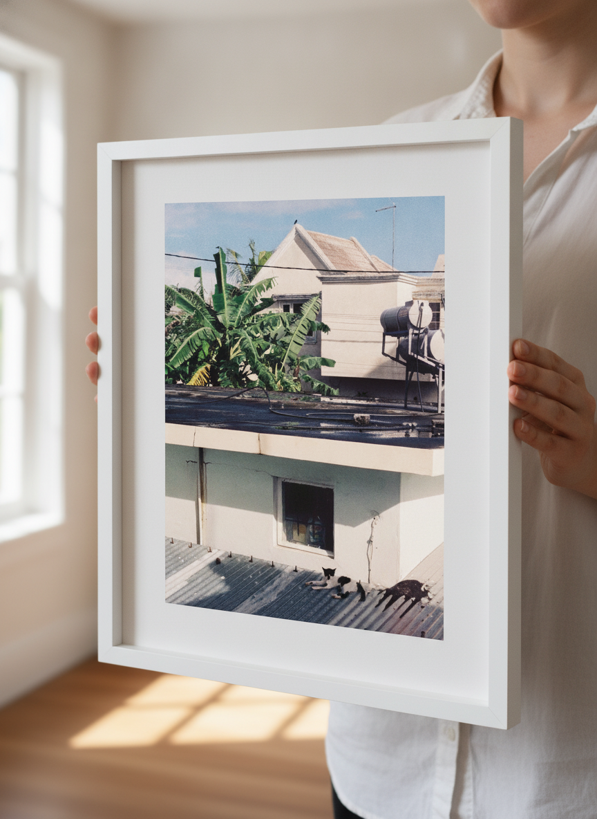 Person showcasing the artwork against a clean modern interior wall