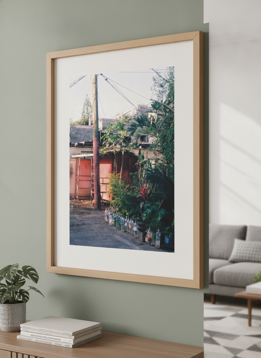 Modern wall art styled above a sofa in a neutral living room