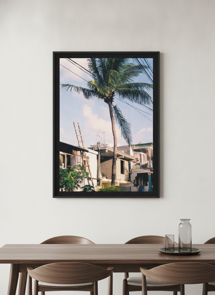 Wall art styled above a dining table in a contemporary home
