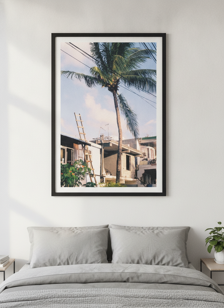 Minimalist artwork displayed in a calm, light-filled bedroom interior