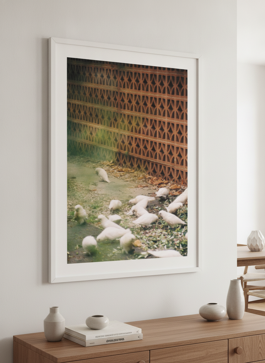 Wall art styled above a dining table in a contemporary home