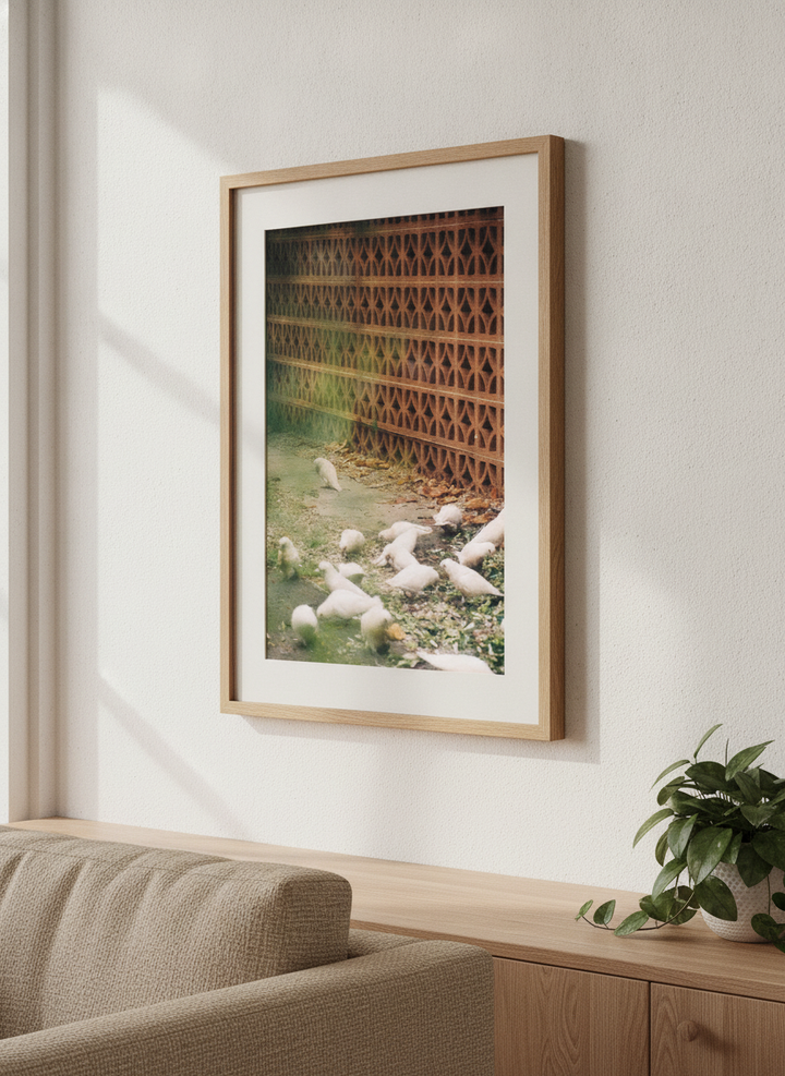 Artwork displayed above a credenza in a real-looking contemporary home
