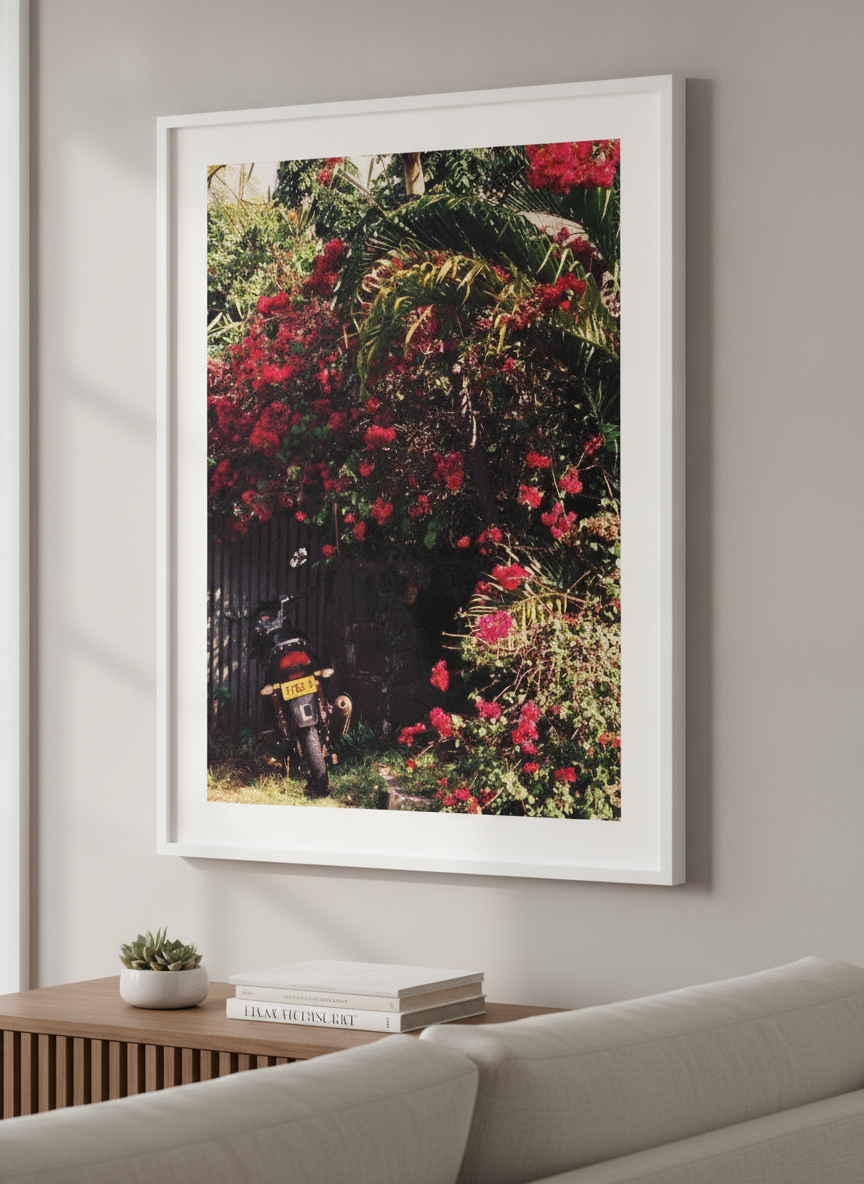 Modern wall art styled above a sofa in a neutral living room
