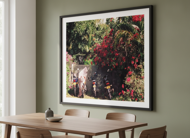 Wall art styled above a dining table in a contemporary home