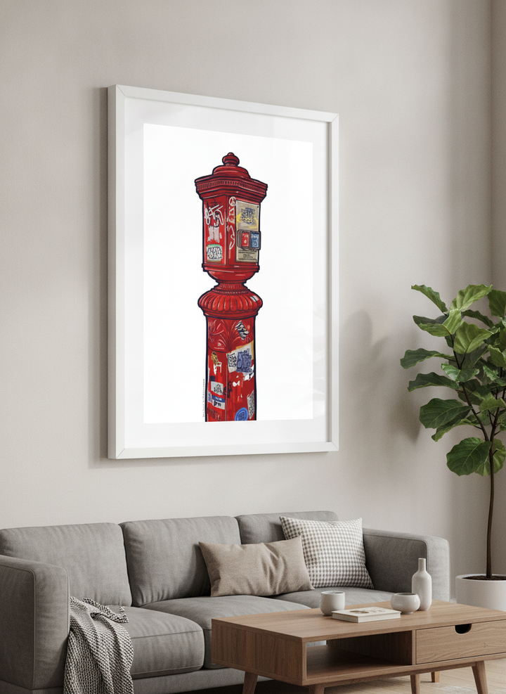 Modern wall art styled above a sofa in a neutral living room