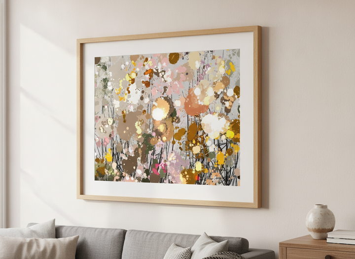 Modern wall art styled above a sofa in a neutral living room