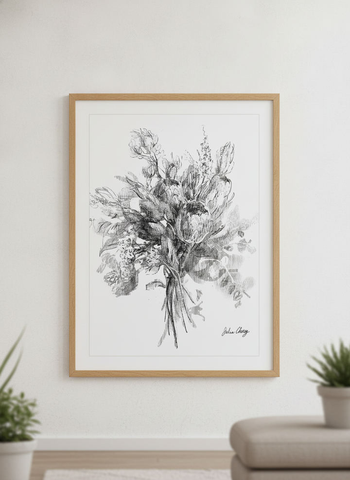 Modern wall art styled above a sofa in a neutral living room