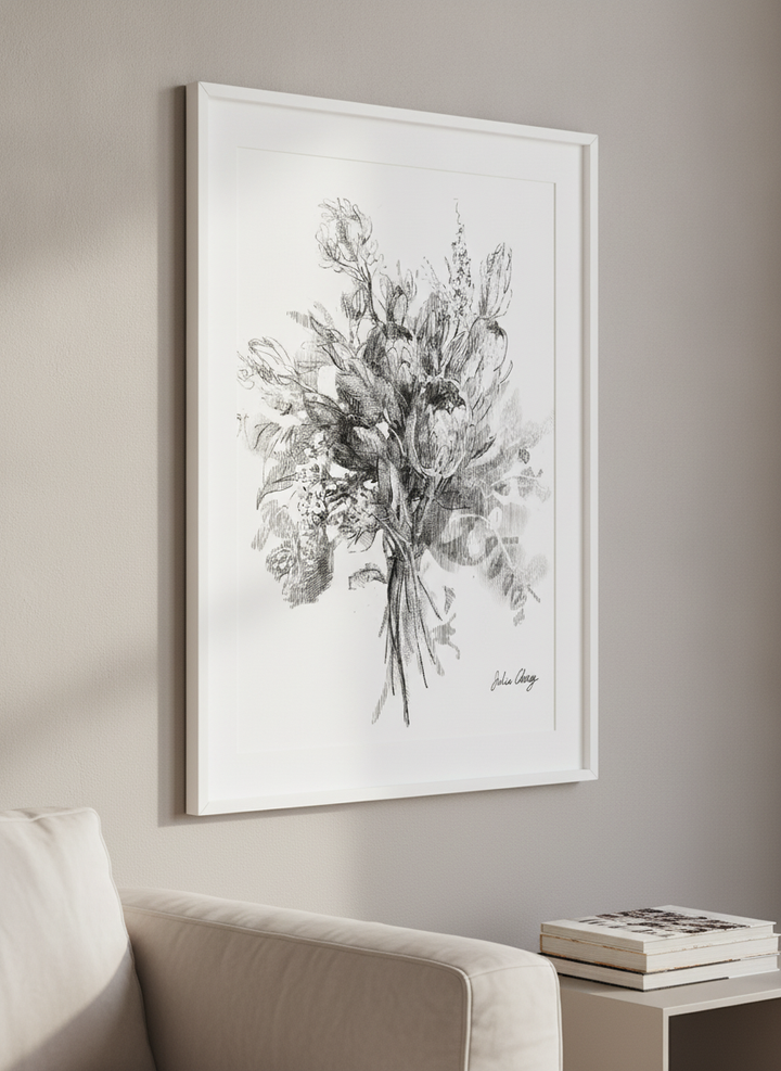 Modern wall art styled above a sofa in a neutral living room