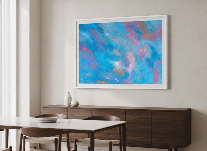 Wall art styled above a dining table in a contemporary home