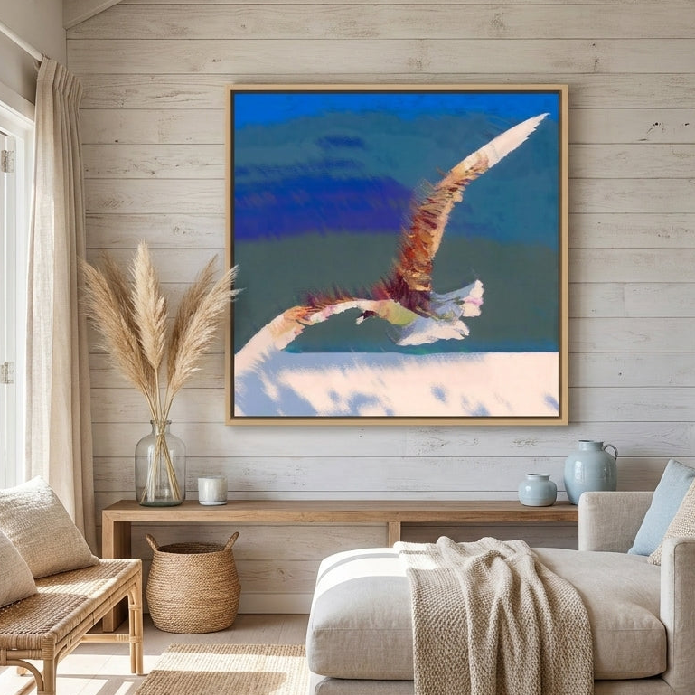 Oversized statement canvas wall art with a natural timber surround styled in a sunny coastal beach house
