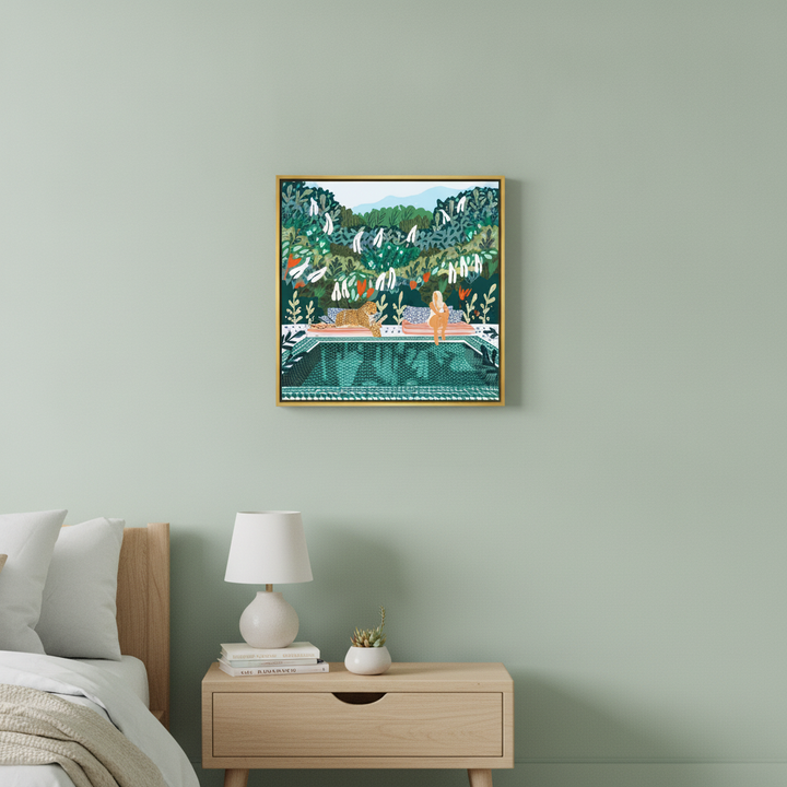 Canvas wall art with a gold leaf surround styled in a calm, light-filled bedroom