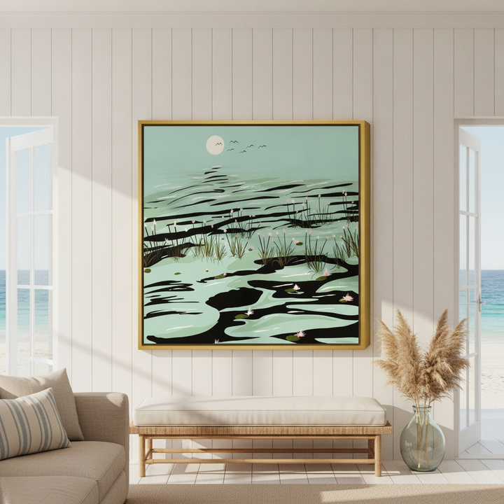 Oversized statement canvas wall art with a gold leaf surround styled in a sunny coastal beach house