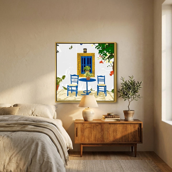 Canvas wall art with a gold leaf surround styled in a calm, light-filled bedroom