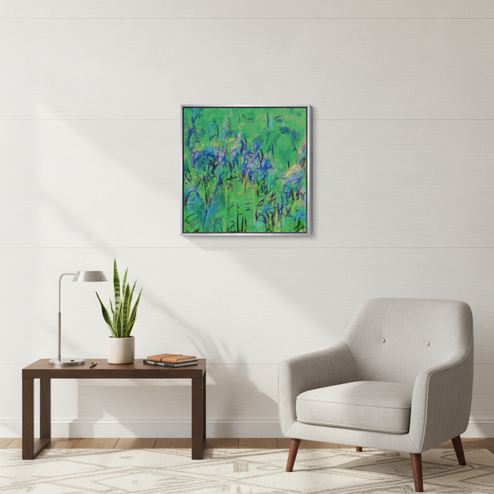 Canvas wall art with a silver leaf surround styled in a bright modern office