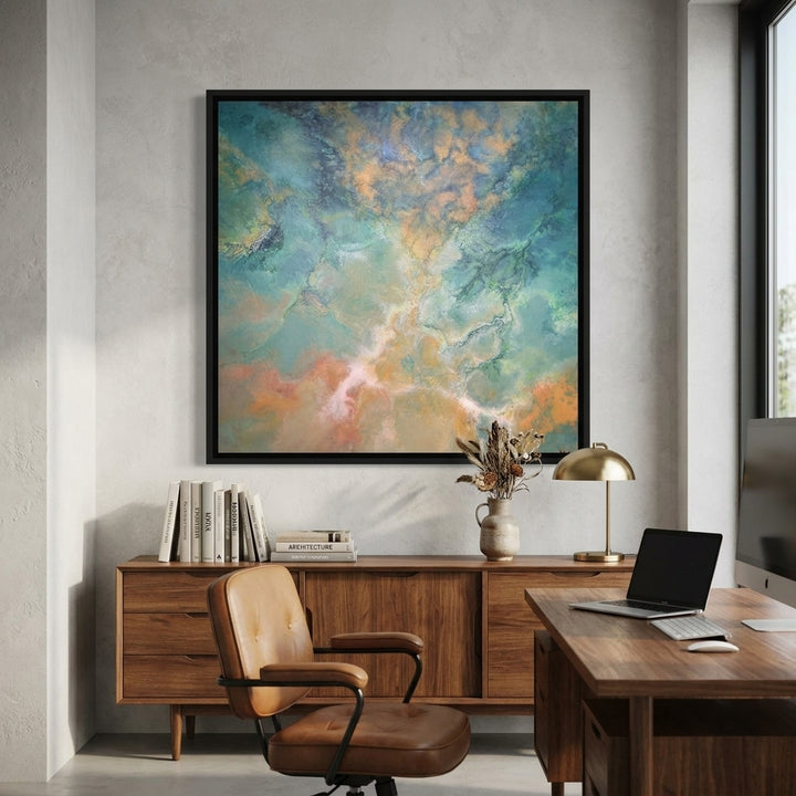 Canvas wall art with a black surround styled in a bright modern office