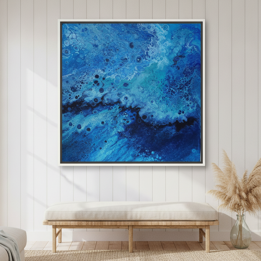 Oversized statement canvas wall art with a white surround styled in a sunny coastal beach house