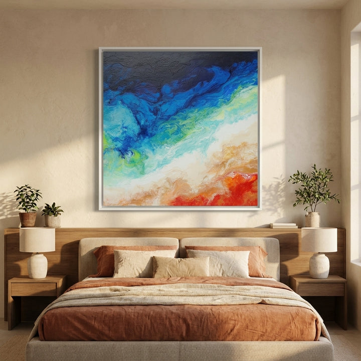 Canvas wall art with a white surround styled in a calm, light-filled bedroom