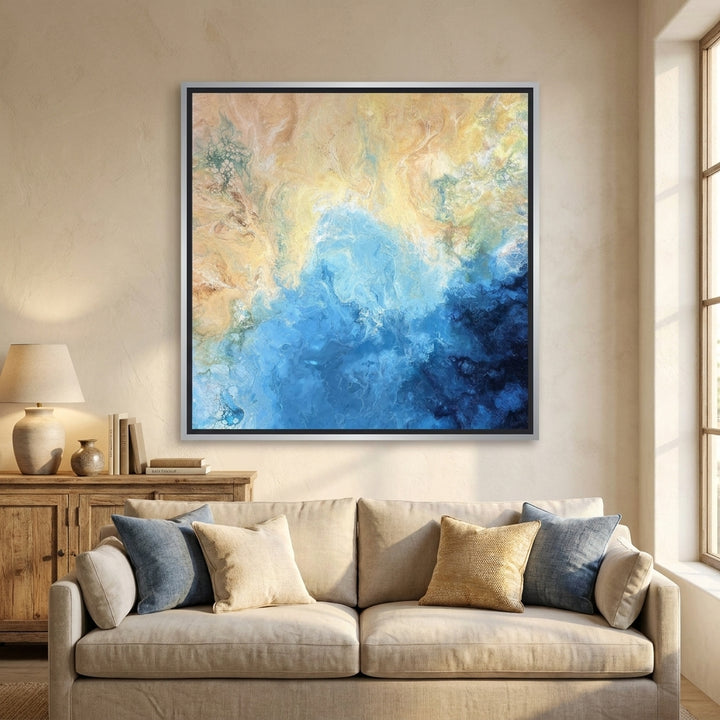 Canvas wall art with a silver leaf surround styled in a neutral living room