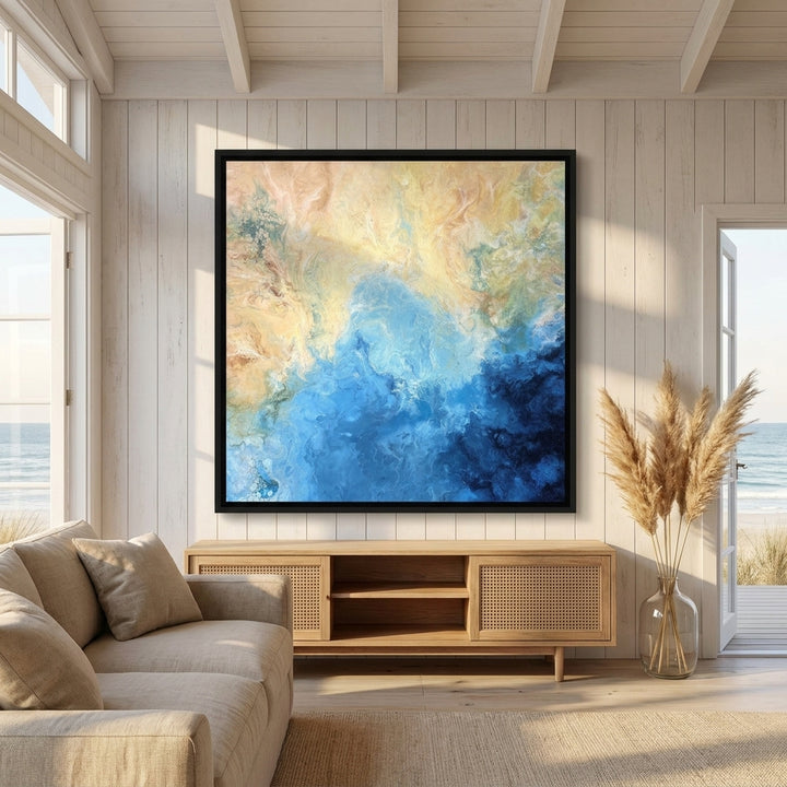 Oversized statement canvas wall art with a black surround styled in a sunny coastal beach house