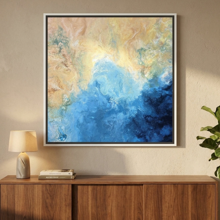 Canvas wall art with a white surround styled in a bright modern office