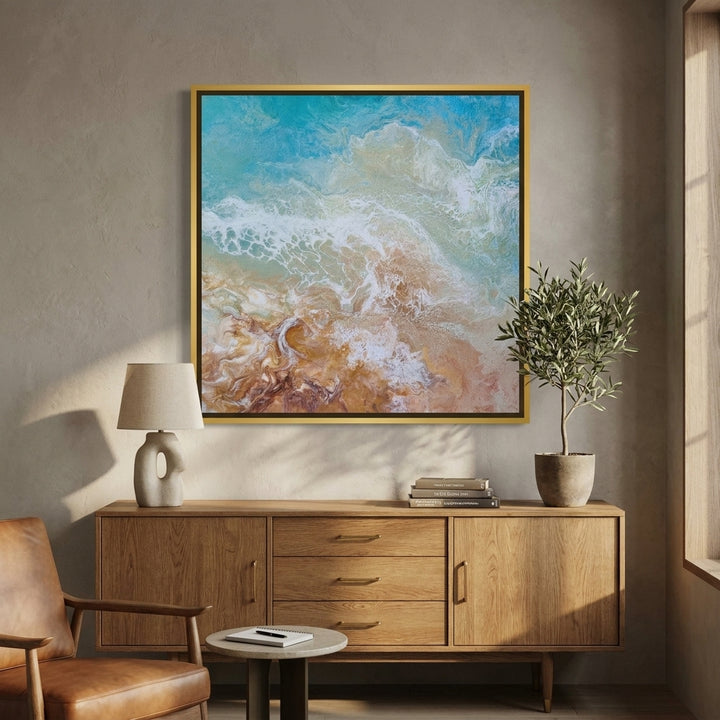 Canvas wall art with a gold leaf surround styled in a bright modern office