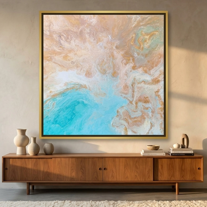 Oversized statement canvas wall art with a gold leaf surround styled in a luxe interior