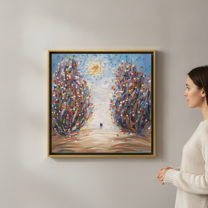 Person holding canvas wall art with a gold leaf surround